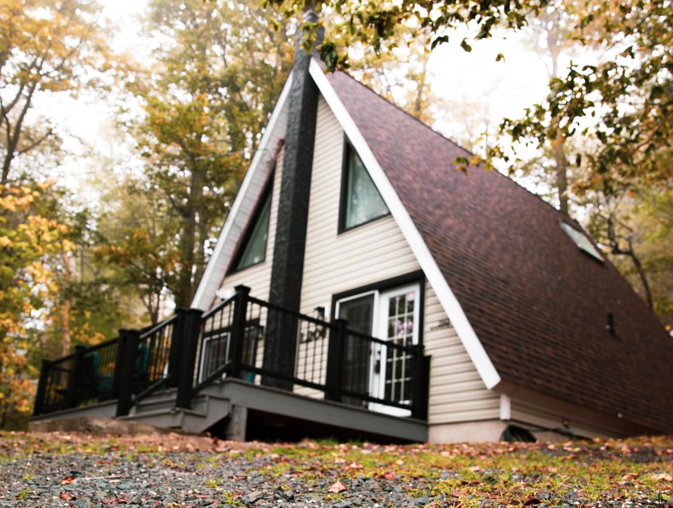 Bella Casa A-Frame cabin nestled among the trees in the Pocono Mountains