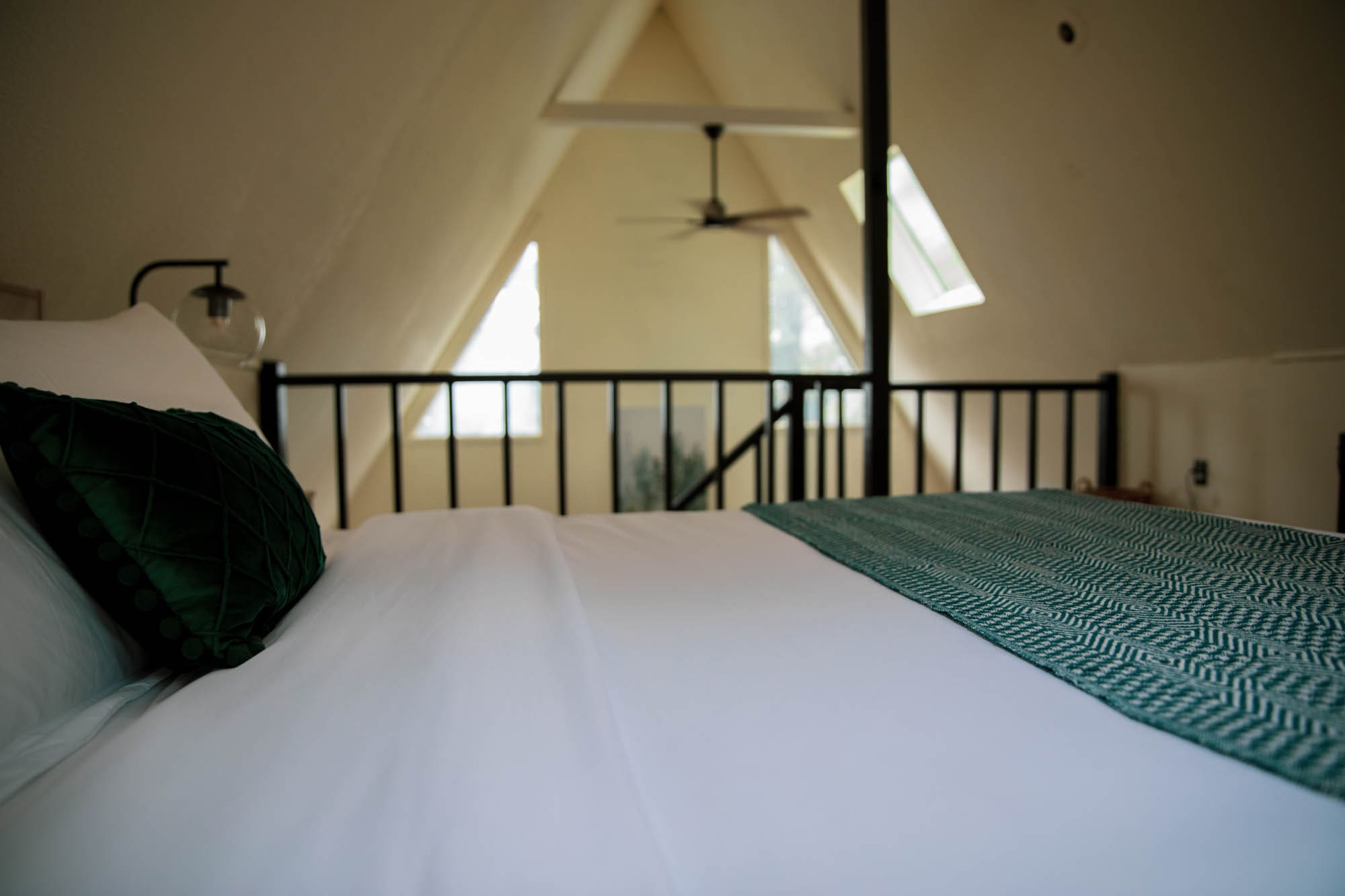 Vaulted A-frame ceiling and skylights above the loft at Bella Casa Cabin in the Poconos