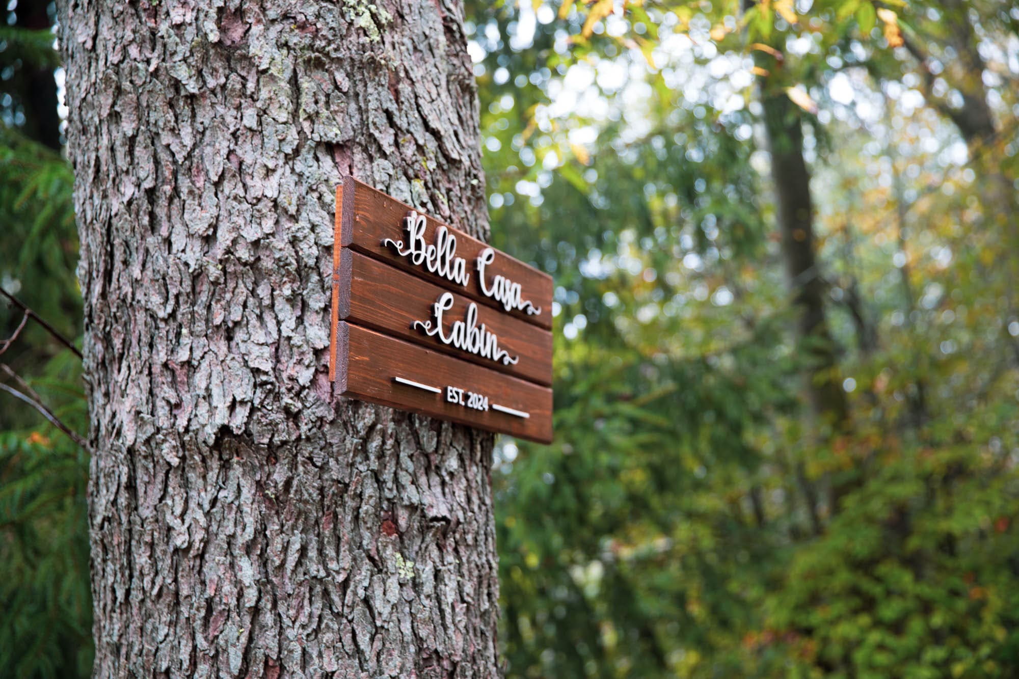Bella Casa Cabin sign at the cabin entrance