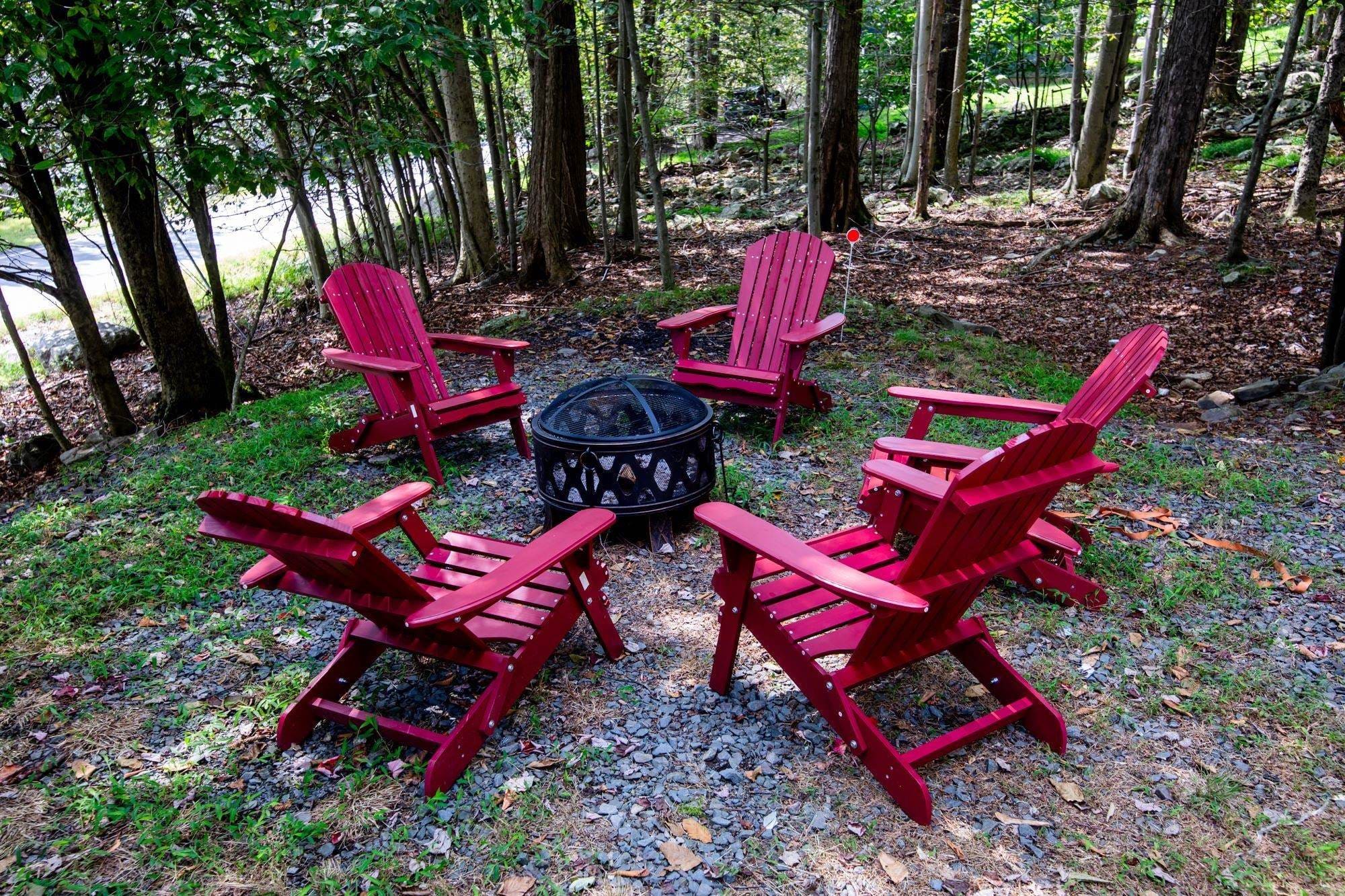 Outdoor fire pit and Adirondack chairs at Bella Casa